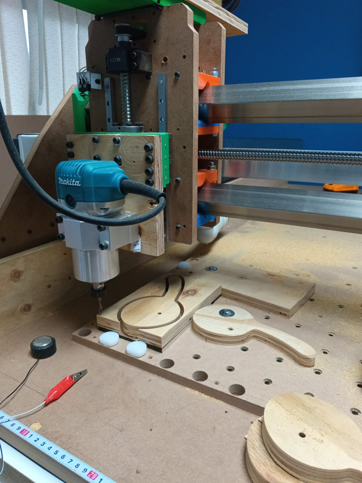 Close up of CNC spindle and workshop