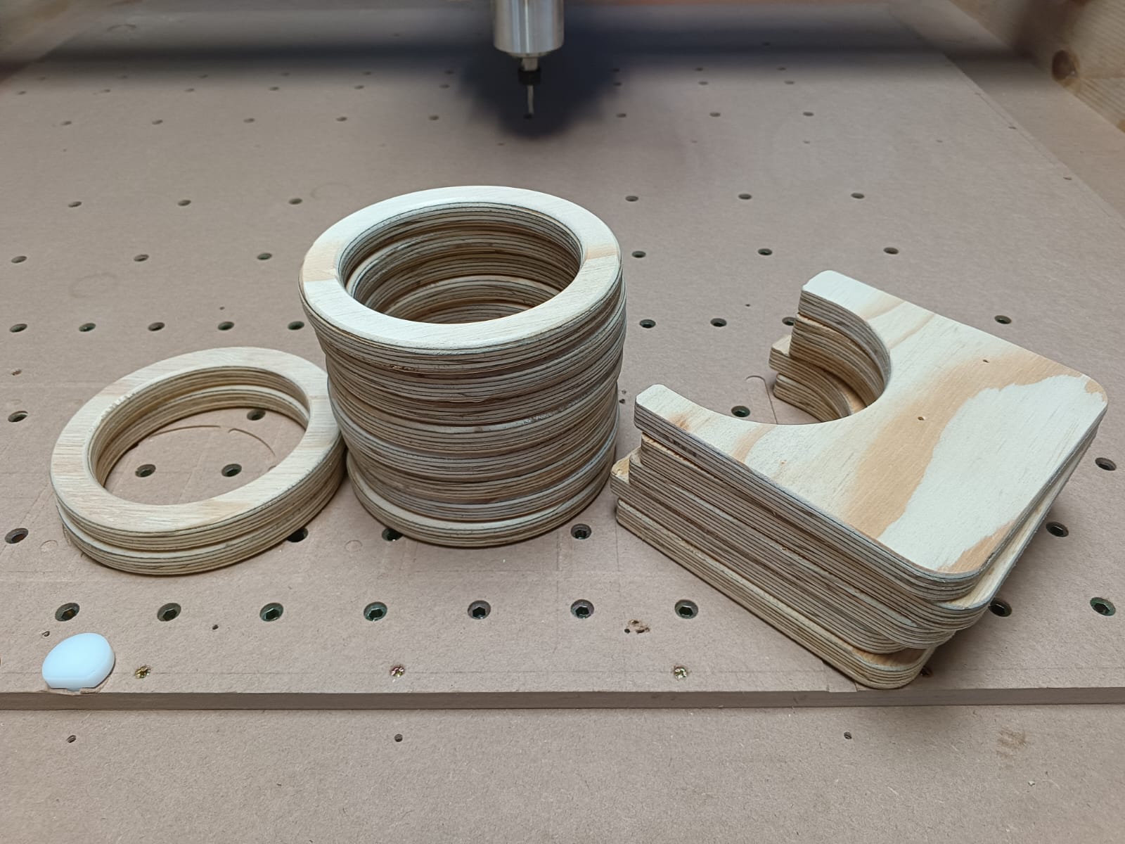 CNC cut plywood rings and custom wooden pieces